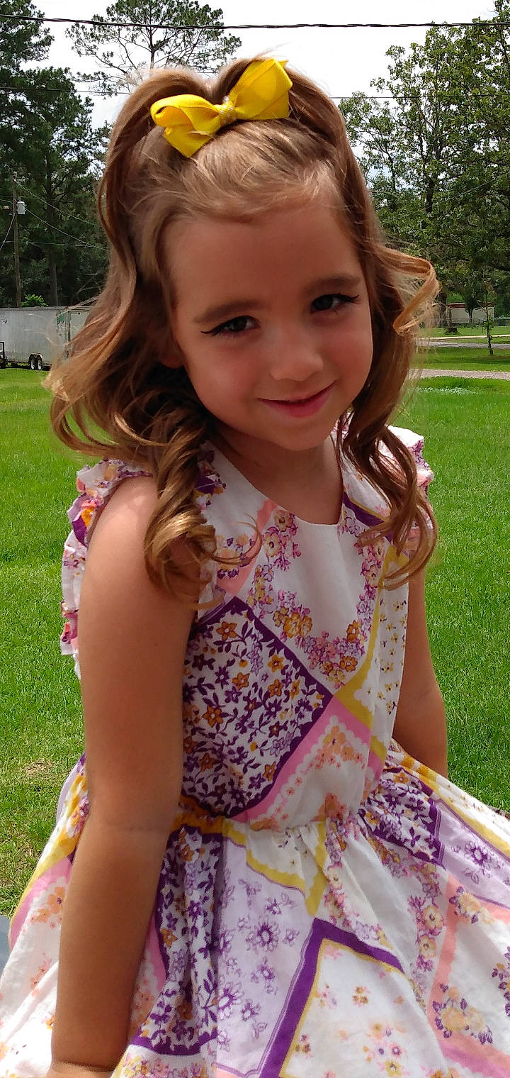 Harley joined the competition — help win amazing prizes! botany, dress, eyelash, face, fawn, fun, grass, green, hair, hairstyle, happy, iris, joy, lip, neck, people_in_nature, person, pink, plant, smile