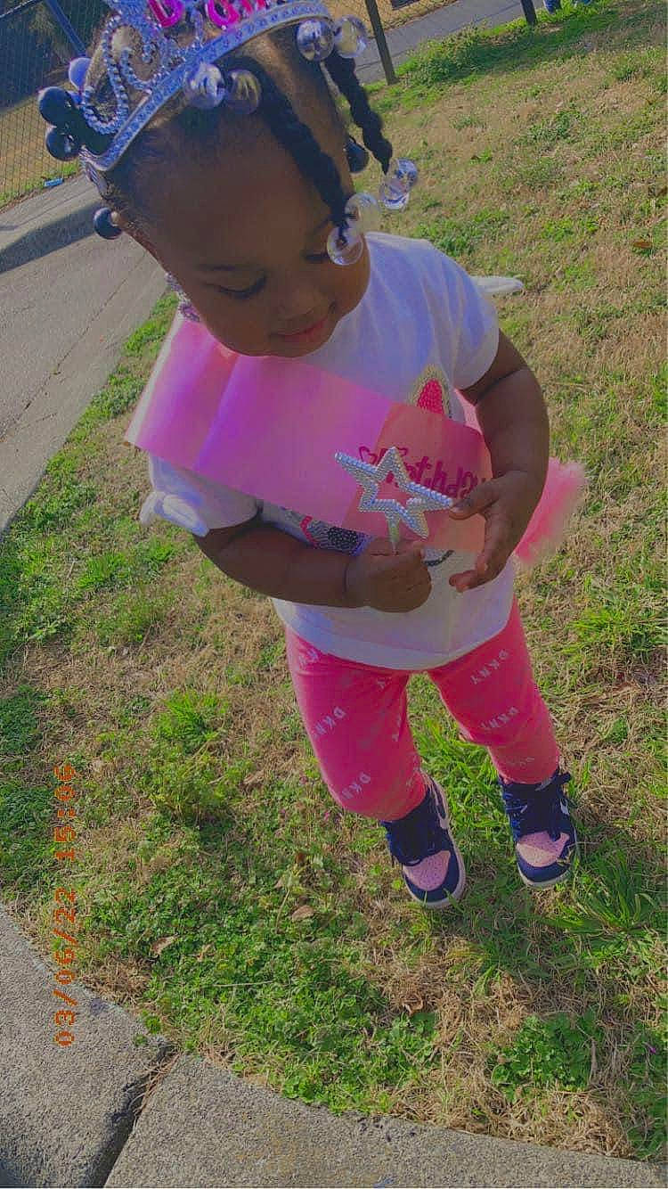 Kemari is registered to the contest to win money with this photo: baby_toddler_clothing, child, fun, grass, happy, hat, headgear, knee, leisure, magenta, person, pink, plant, recreation, shoe, shorts, sneakers, sock, soil, thigh