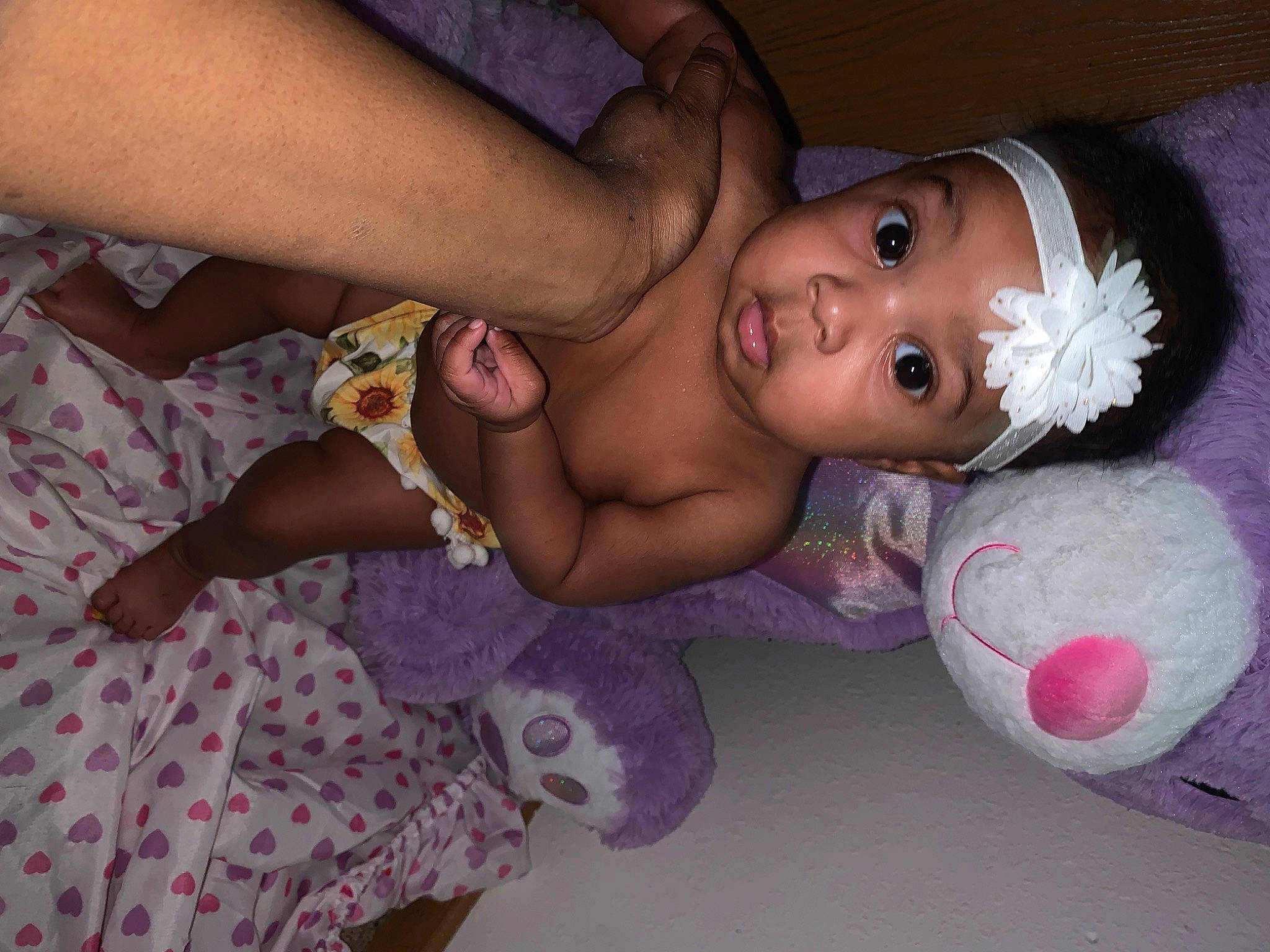 Dasani joined the competition — help win amazing prizes! abdomen, baby, chest, child, finger, flooring, foot, fun, hand, happy, headwear, human_leg, iris, nail, pattern, person, pink, purple, surprise, textile