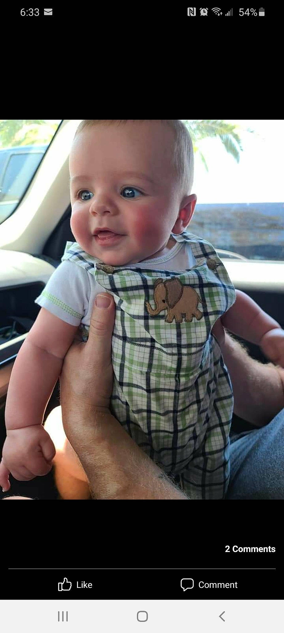 Conor is registered to the contest to win money with this photo: arm, baby, baby_toddler_clothing, cool, elbow, finger, flash_photography, gesture, hand, happy, joint, lip, mouth, muscle, person, skin, sleeve, smile, tartan, thumb