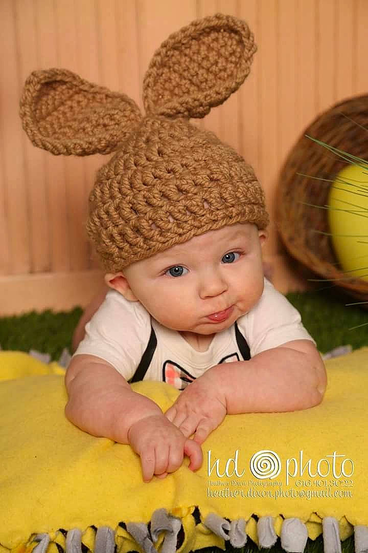 Lenox is registered to the contest to win money with this photo: child, headwear, infant, toy