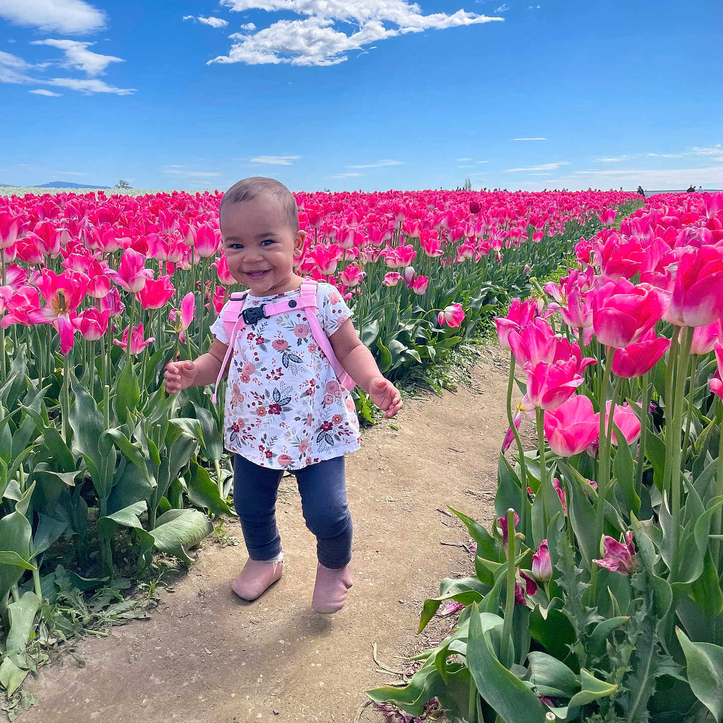 Isabella is registered to the contest to win money with this photo: baby, daisy, face, flower, grass, head, herbal, herbs, nature, outdoors, park, person, petal, photography, plant, portrait, sky, soil, summer, walking