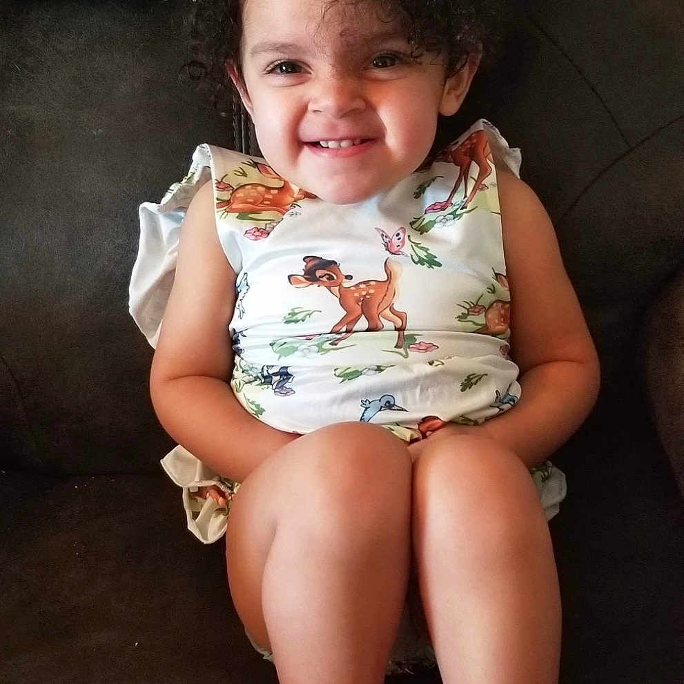 Khalani is registered to the contest to win money with this photo: baby, baby_toddler_clothing, beauty, cheek, child, child_model, daughter, dress, fun, human_leg, joy, leg, person, sitting, skin, smile, thigh, toddler