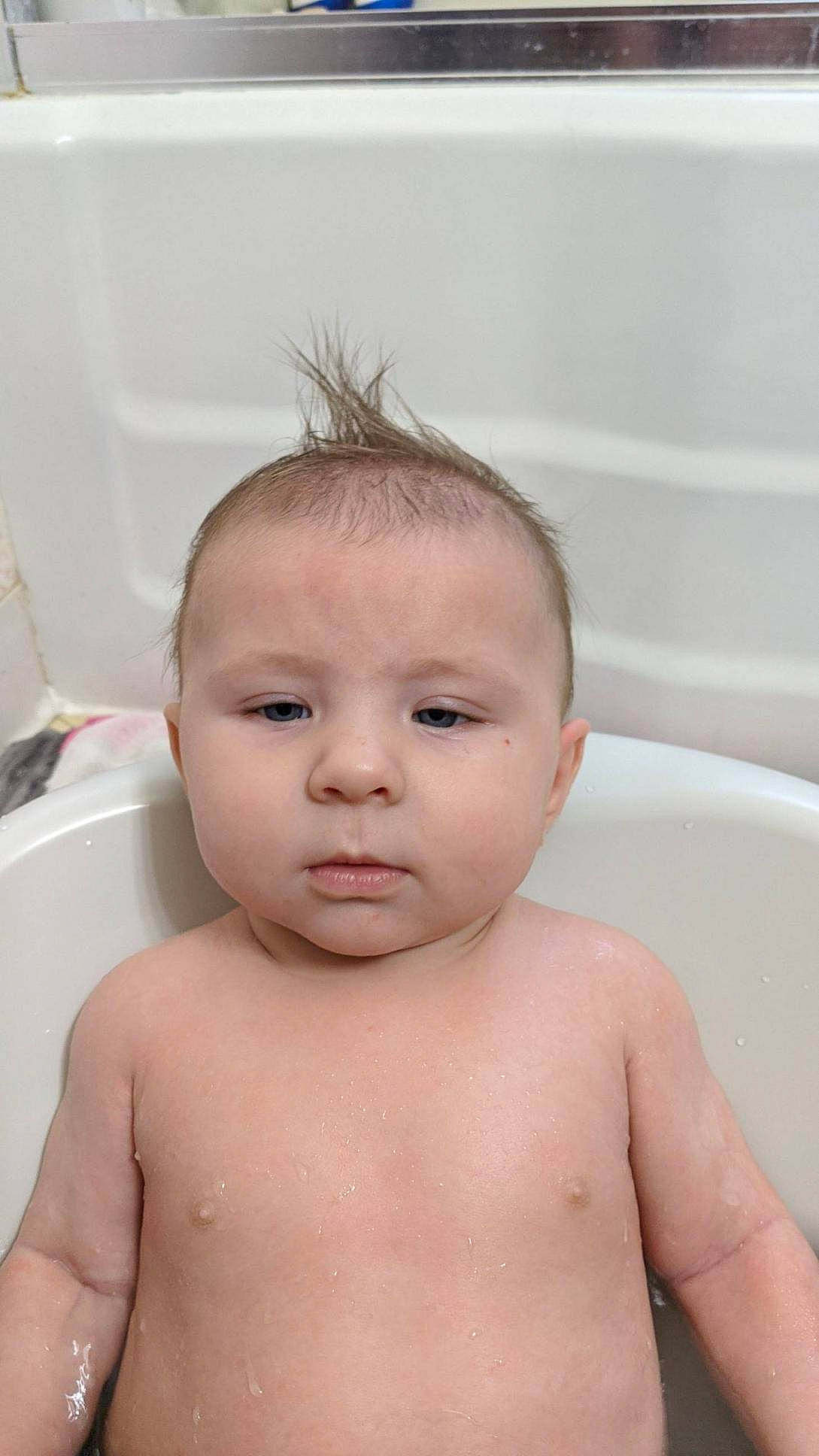 Declan is registered to the contest to win money with this photo: barechested, bathtub, cheek, chest, child, chin, ear, eyebrow, eyelash, fluid, forehead, hairstyle, iris, joint, muscle, neck, organ, person, shoulder, skin