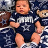 baby, infant, child, portrait, sitting, sports_fan, football, american_football, dallas_cowboys, team_jersey, helmet, teddy_bear, blanket, bib, socks, star_pattern, navy_blue, indoor, smiling, sports_merchandise