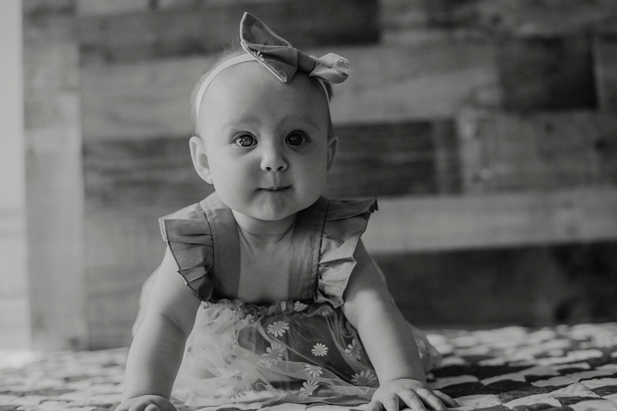 Daisy joined the competition — help win amazing prizes! baby, baby_toddler_clothing, black, black_and_white, child, dress, eyewear, flash_photography, fun, grass, happy, monochrome, monochrome_photography, pattern, person, sitting, smile, stock_photography, style, toddler