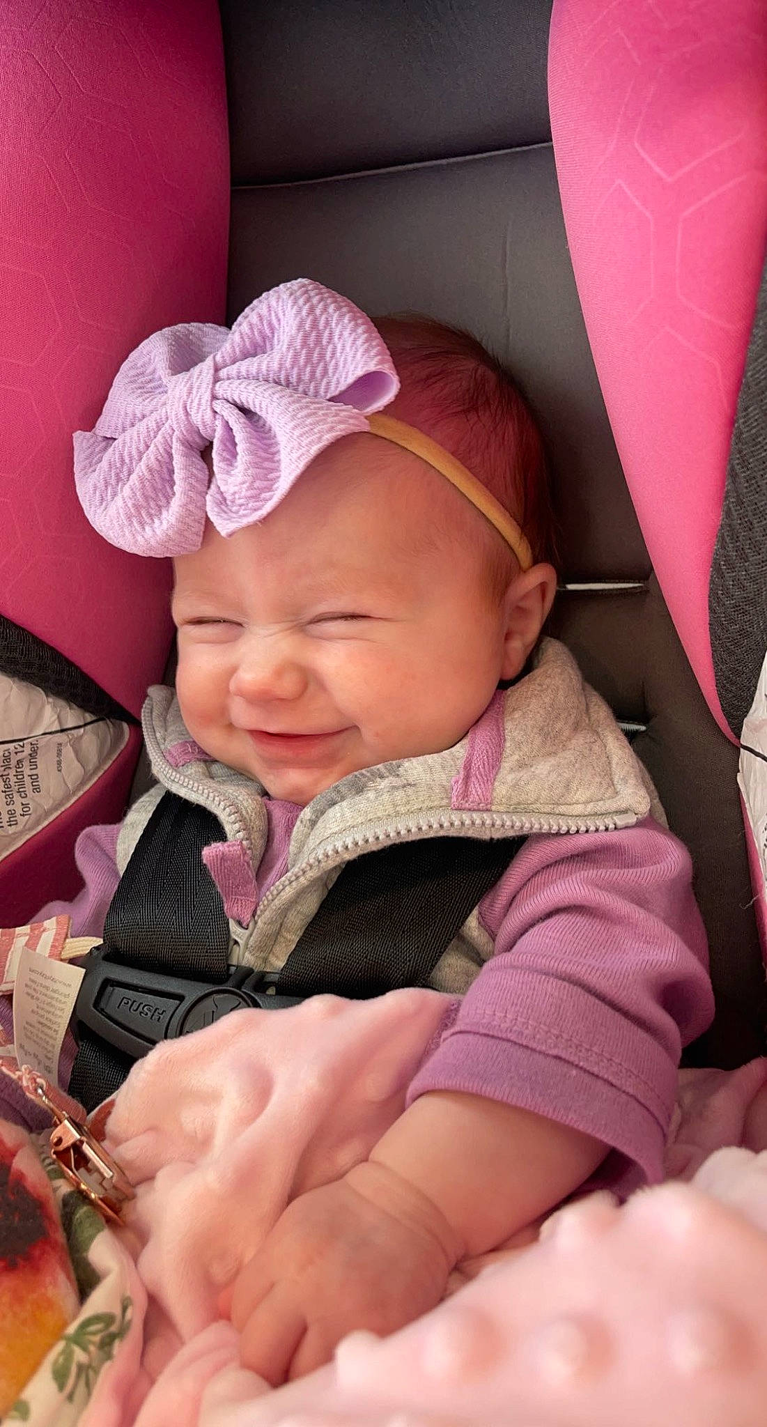 Dallas is registered to the contest to win money with this photo: baby, baby_toddler_clothing, cheek, child, comfort, eyebrow, facial_expression, happy, head, headgear, headwear, lip, mouth, nose, outerwear, person, pink, product, skin, smile