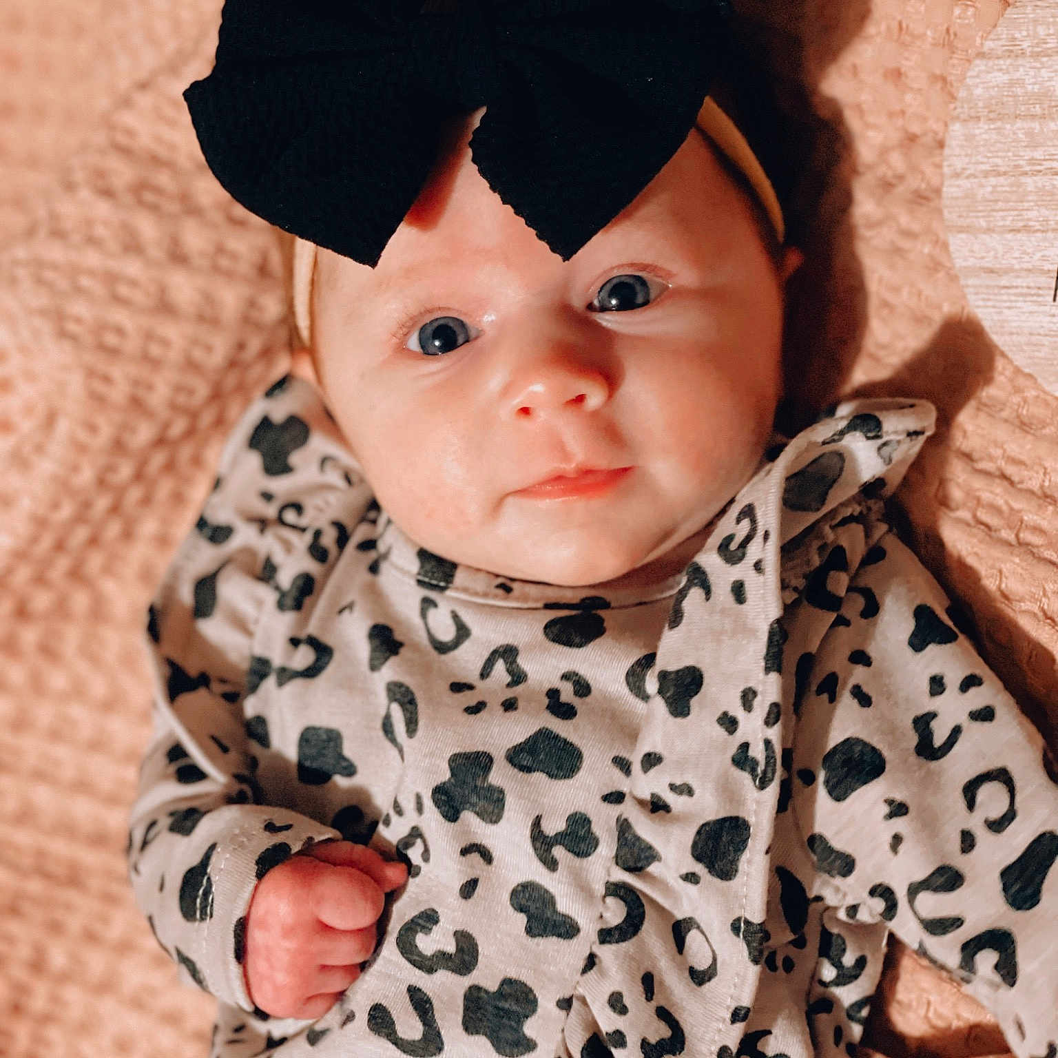 Dallas is registered to the contest to win money with this photo: baby, baby_toddler_clothing, cap, cheek, child, clothing, collar, eye, eyelash, face, happy, head, lip, neck, outerwear, pattern, pink, skin, sleeve, toddler