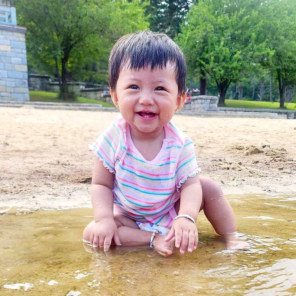 Mairah Tamang joined the competition — help win amazing prizes! baby, face, grass, grove, head, land, nature, outdoors, park, person, photography, plant, portrait, rock, soil, summer, tree, vegetation, water, woodland