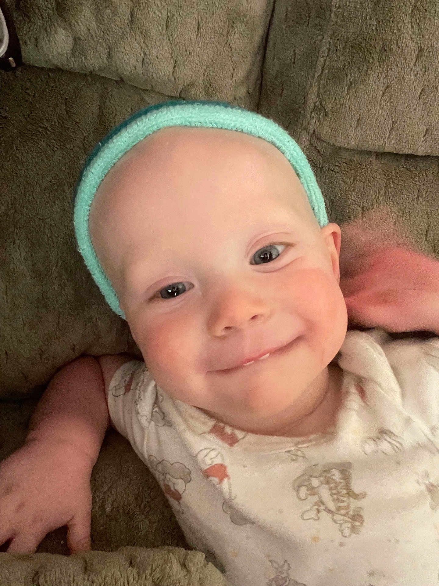 Phoenix joined the competition — help win amazing prizes! baby, child, smiling, headband, couch, infant, onesie, face, happy, closeup, portrait, skin, hand, cute, young, indoors, relaxed, comfort, expression, person