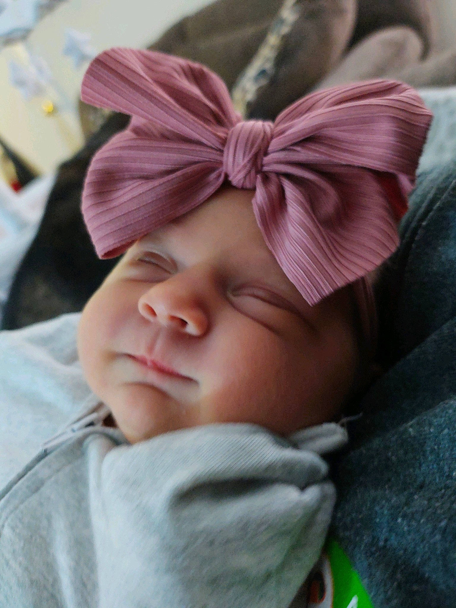 Peighton joined the competition — help win amazing prizes! baby, cheek, child, chin, comfort, eye, eyebrow, face, fashion_accessory, hair_accessory, hand, happy, head, headgear, headpiece, headwear, linens, magenta, person, petal