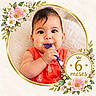 Helena joined the competition — help win amazing prizes! baby, infant, child, portrait, smiling, teether, toy, sitting, red_outfit, floral_frame, flowers, leaves, golden_circle, birthday, six_months, close_up, indoors, soft_blanket, round_sign, decorative