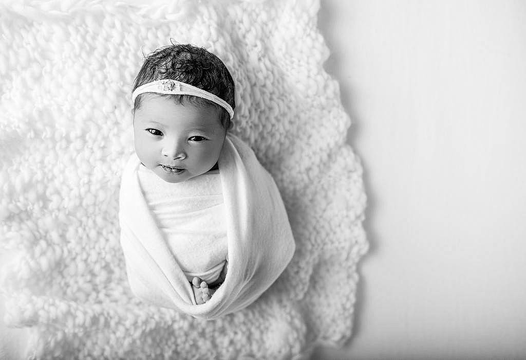 Aaliyah joined the competition — help win amazing prizes! baby, cap, close_up, eye, eyelash, face, fashion_accessory, flash_photography, freezing, fur, happy, head, headpiece, human_body, knit_cap, lip, monochrome, monochrome_photography, person, toddler