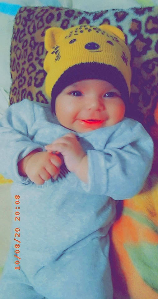 Meziane participe au concours pour gagner de l'argent avec cette photo : baby, baby_laughing, baby_toddler_clothing, beanie, bonnet, cheek, child, cool, costume_accessory, craft, creative_arts, crochet, facial_expression, headwear, joy, knit_cap, knitting, person, textile, toddler