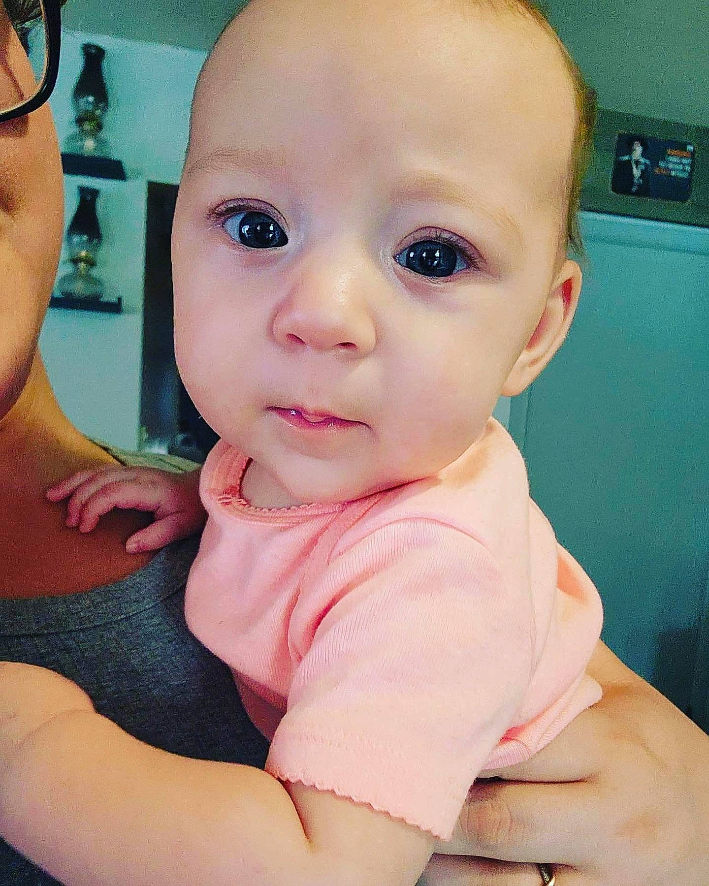 Adalynn is registered to the contest to win money with this photo: baby, baby_toddler_clothing, cheek, chest, child, comfort, elbow, eyelash, finger, gesture, happy, iris, kitchen_appliance, lip, nose, person, sitting, skin, sleeve, thumb