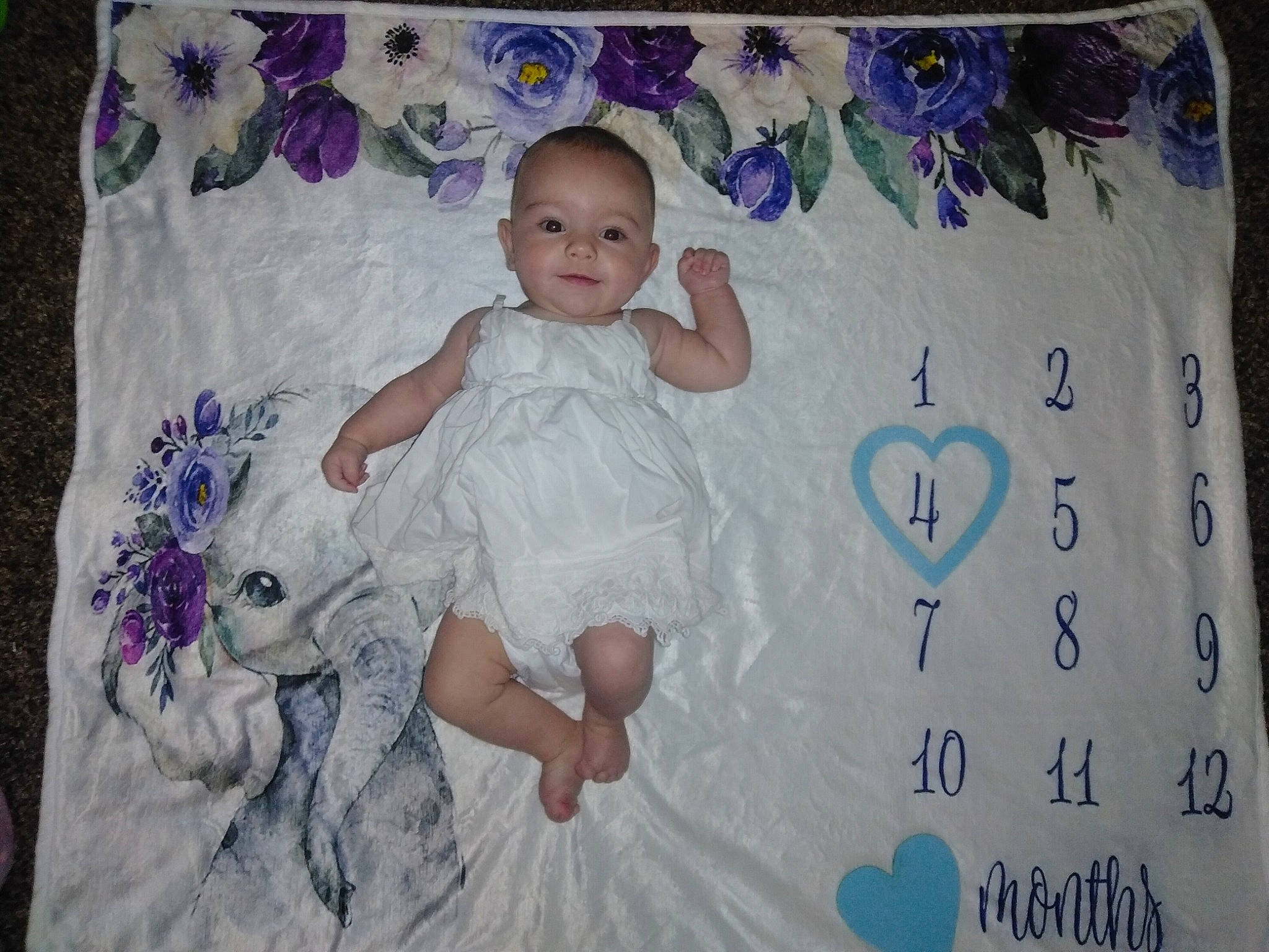 Reposa is registered to the contest to win money with this photo: art, azure, baby, baby_products, baby_toddler_clothing, bedding, child, happy, linens, magenta, pattern, person, pink, product, purple, room, sleeve, smile, t_shirt, textile