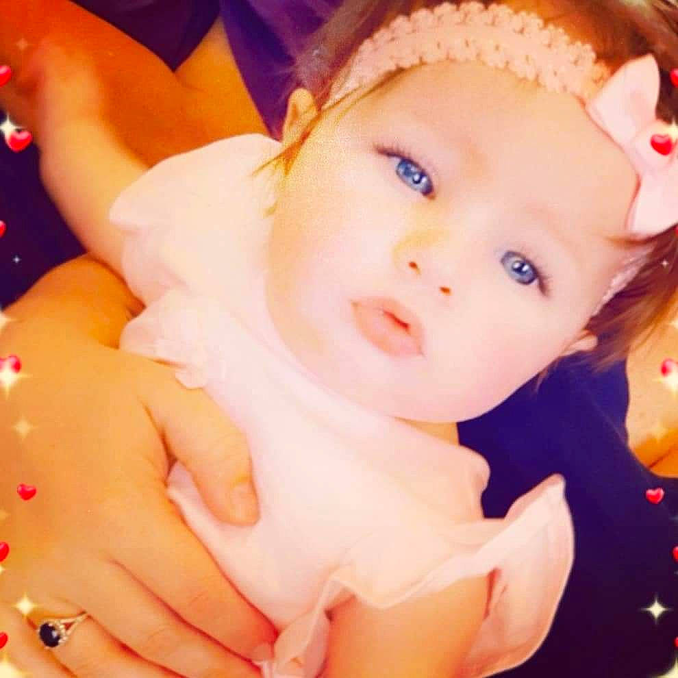 Kinlee is registered to the contest to win money with this photo: baby, beauty, cheek, child, ear, eye, face, finger, forehead, hair, hand, head, human, lip, mouth, nose, person, pink, skin, smile