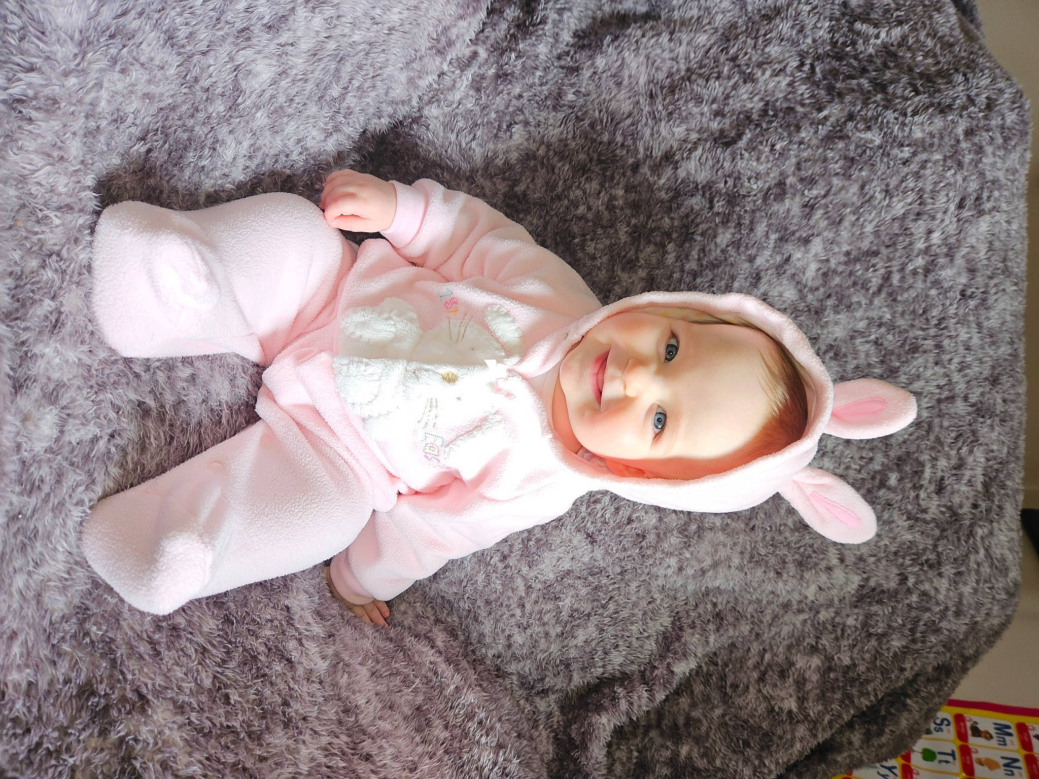 Kaylynn joined the competition — help win amazing prizes! baby, baby_products, baby_toddler_clothing, baby_toys, cheek, child, comfort, doll, fashion_accessory, foot, hat, human_body, joy, linens, person, pink, room, sitting, sleeve, toddler