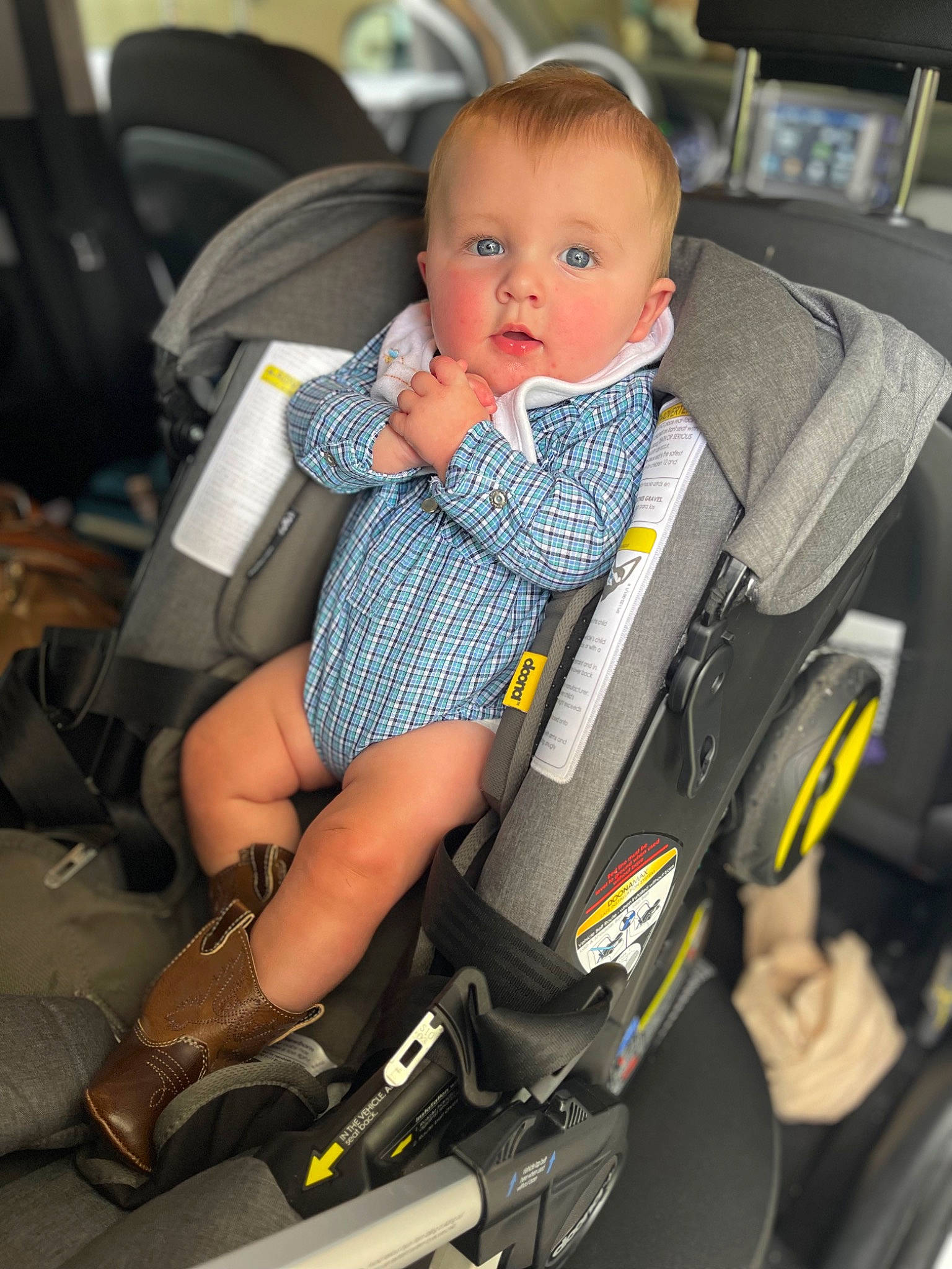 Floyd is registered to the contest to win money with this photo: auto_part, baby, baby_carriage, baby_products, baby_safety, baby_toddler_clothing, bag, car_seat, chair, child, comfort, human_leg, knee, lap, person, seat_belt, service, sitting, surprise, thigh