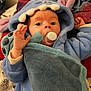 Lynao a rejoint le concours — aidez-le/la à gagner de superbes lots ! baby, pacifier, blanket, blue_onesie, hood, child, infant, cute, cozy, soft_toy, bed, pillow, cartoon_character, expression, hand, face, indoor, portrait, sleepwear, young_child