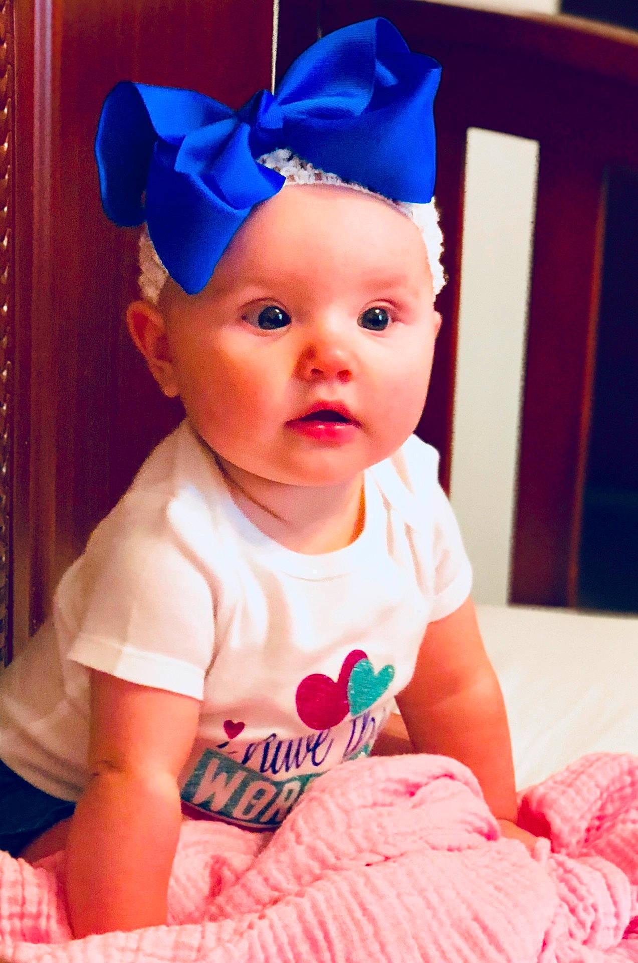Ansleigh is registered to the contest to win money with this photo: cheek, child, day, ear, eye, fashion_accessory, fun, girl, hair_accessory, happiness, headband, headgear, human_hair_color, infant, party_hat, person, pink, product, skin, smile
