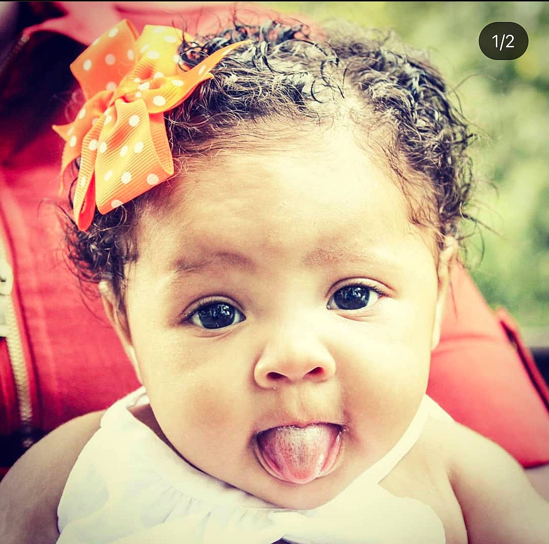 Emeri is registered to the contest to win money with this photo: baby, cheek, chin, ear, eye, eyebrow, eyelash, forehead, gesture, hairstyle, happy, head, iris, jaw, lip, mouth, neck, nose, person, photograph