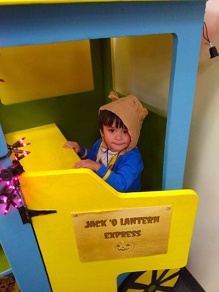 Edy joined the competition — help win amazing prizes! baby, baseball_cap, child, fun, hat, helmet, leisure, person, personal_protective_equipment, play, recreation, room, sitting, sun_hat, sunglasses, toddler, yellow