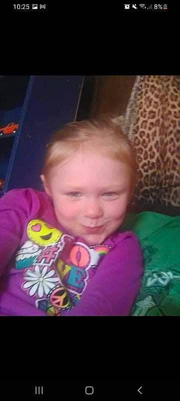 Jasmine is registered to the contest to win money with this photo: baby, baby_toddler_clothing, cheek, child, comfort, forehead, fun, grass, happy, joy, lip, magenta, mouth, nose, organ, pattern, person, room, sitting, smile