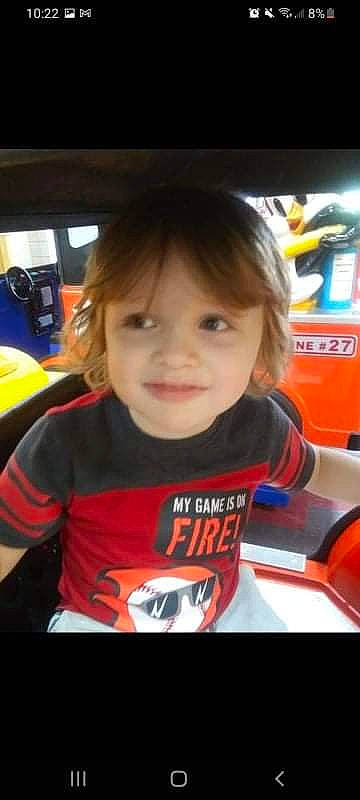 Jordan is registered to the contest to win money with this photo: auto_part, automotive_exterior, automotive_tire, beauty, car_seat, child, chin, fun, hair, hairstyle, happy, head, joy, motor_vehicle, person, recreation, sleeve, smile, t_shirt, toddler