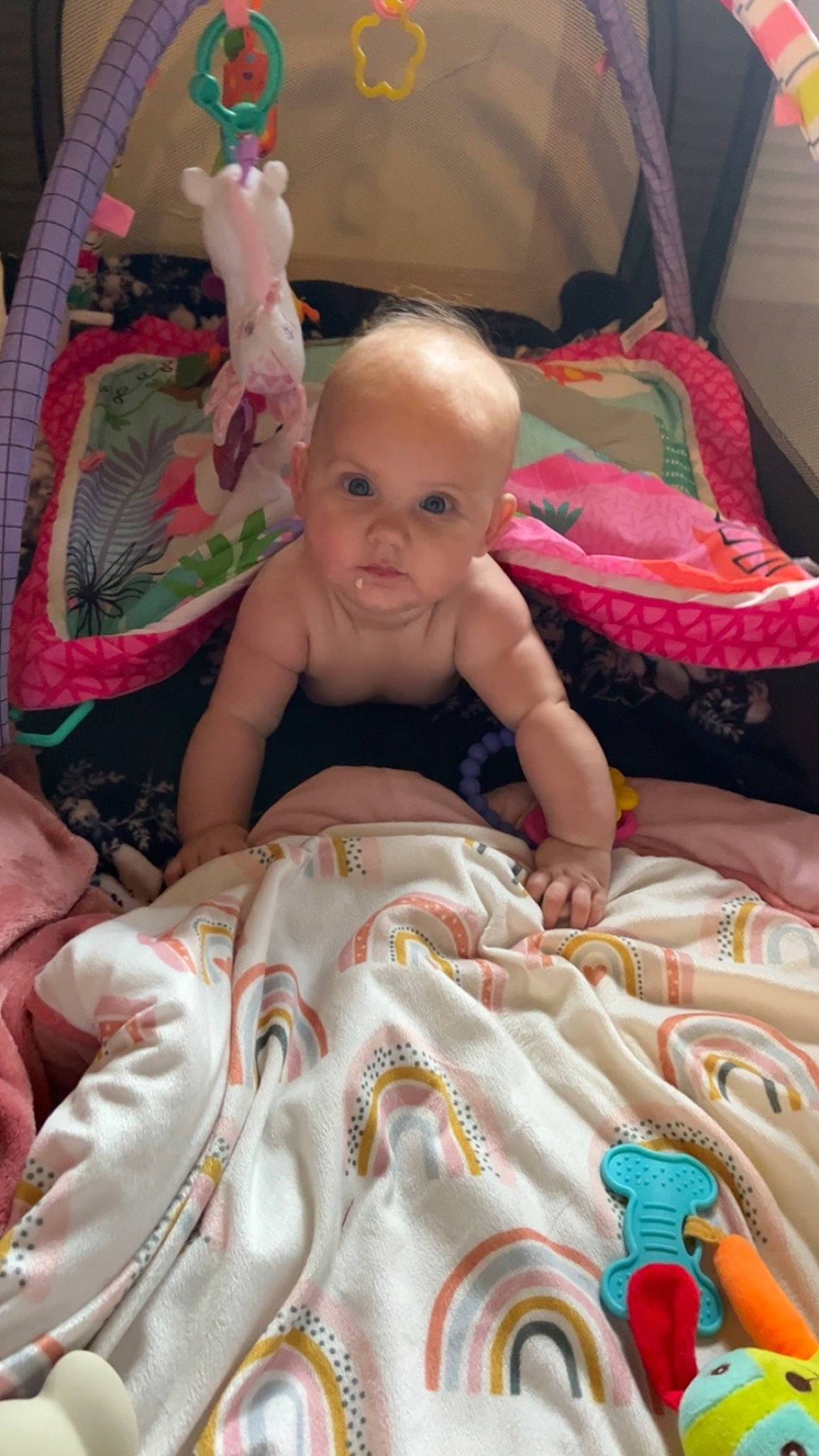 Juniper is registered to the contest to win money with this photo: baby, baby_products, baby_toddler_clothing, bedding, cheek, child, comfort, event, fun, happy, iris, linens, person, pink, product, room, sitting, skin, smile, textile