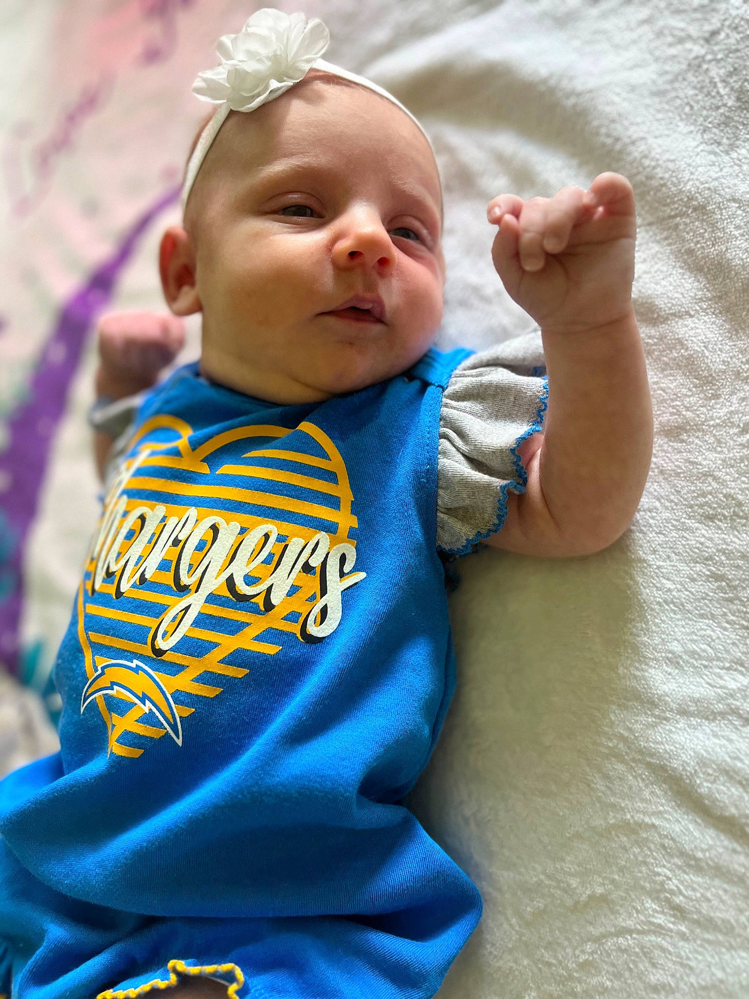 Juniper joined the competition — help win amazing prizes! arm, baby, baby_toddler_clothing, child, electric_blue, fun, gesture, grass, happy, headband, headgear, headpiece, neck, person, skin, sleeve, smile, t_shirt, thumb, tiara