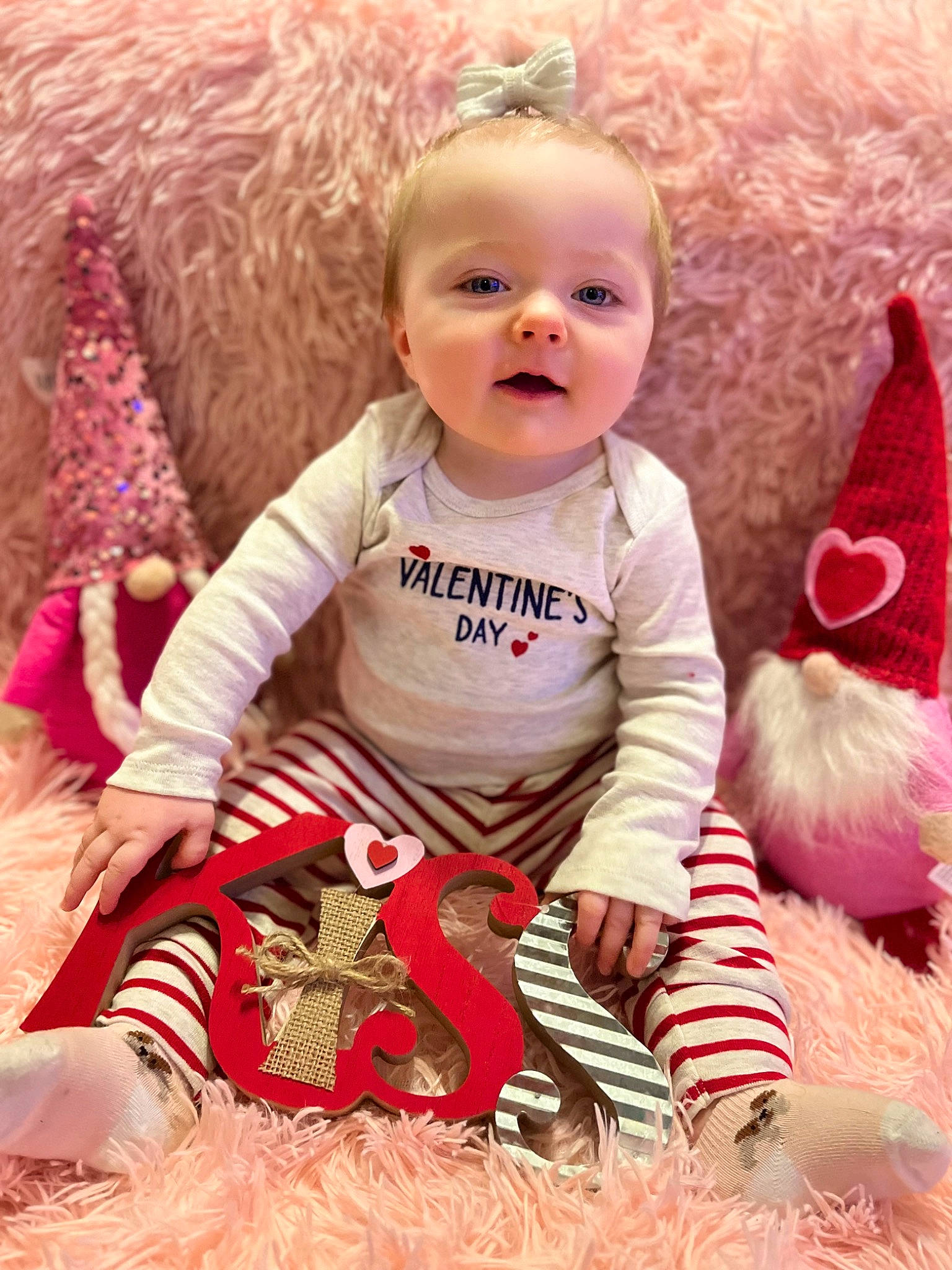 Savannah joined the competition — help win amazing prizes! baby, baby_products, baby_toddler_clothing, cheek, child, dress, fun, grass, happy, linens, magenta, outerwear, pattern, person, pink, sitting, skin, sleeve, smile, t_shirt