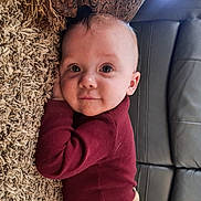 Dean is registered to the contest to win money with this photo: baby, baby_toddler_clothing, cheek, chin, comfort, face, finger, grass, happy, head, human, mammal, nose, organ, plant, skin, smile, toddler, tree, wood