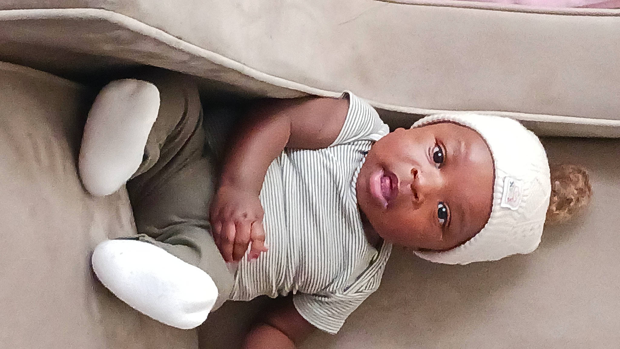 Legend joined the competition — help win amazing prizes! arm, baby, baby_toddler_clothing, barefoot, child, comfort, eye, finger, gesture, hand, head, headwear, human_body, joint, linens, mammal, mouth, nose, person, skin