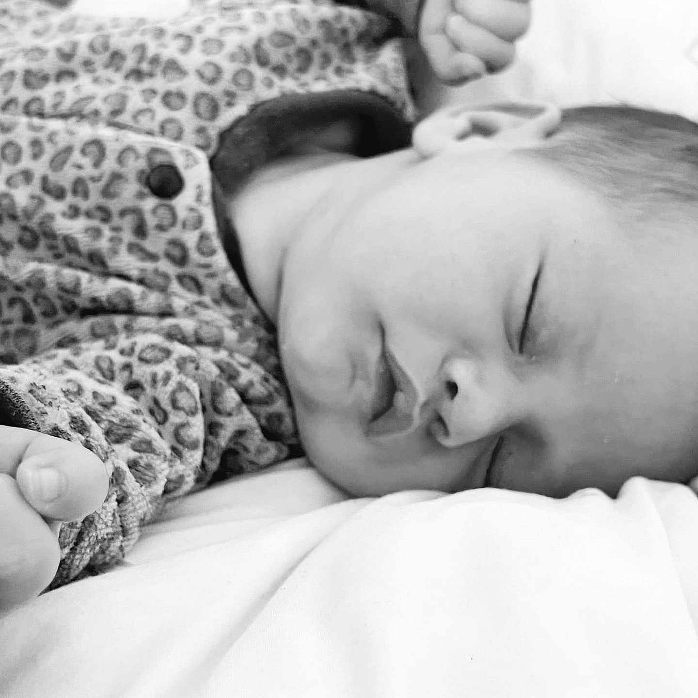 Tilly participe au concours pour gagner de l'argent avec cette photo : baby, bed, bedroom, blanket, bodypart, face, finger, furniture, hand, happy, head, indoors, newborn, person, photography, portrait, quilt, room, sleeping, smile
