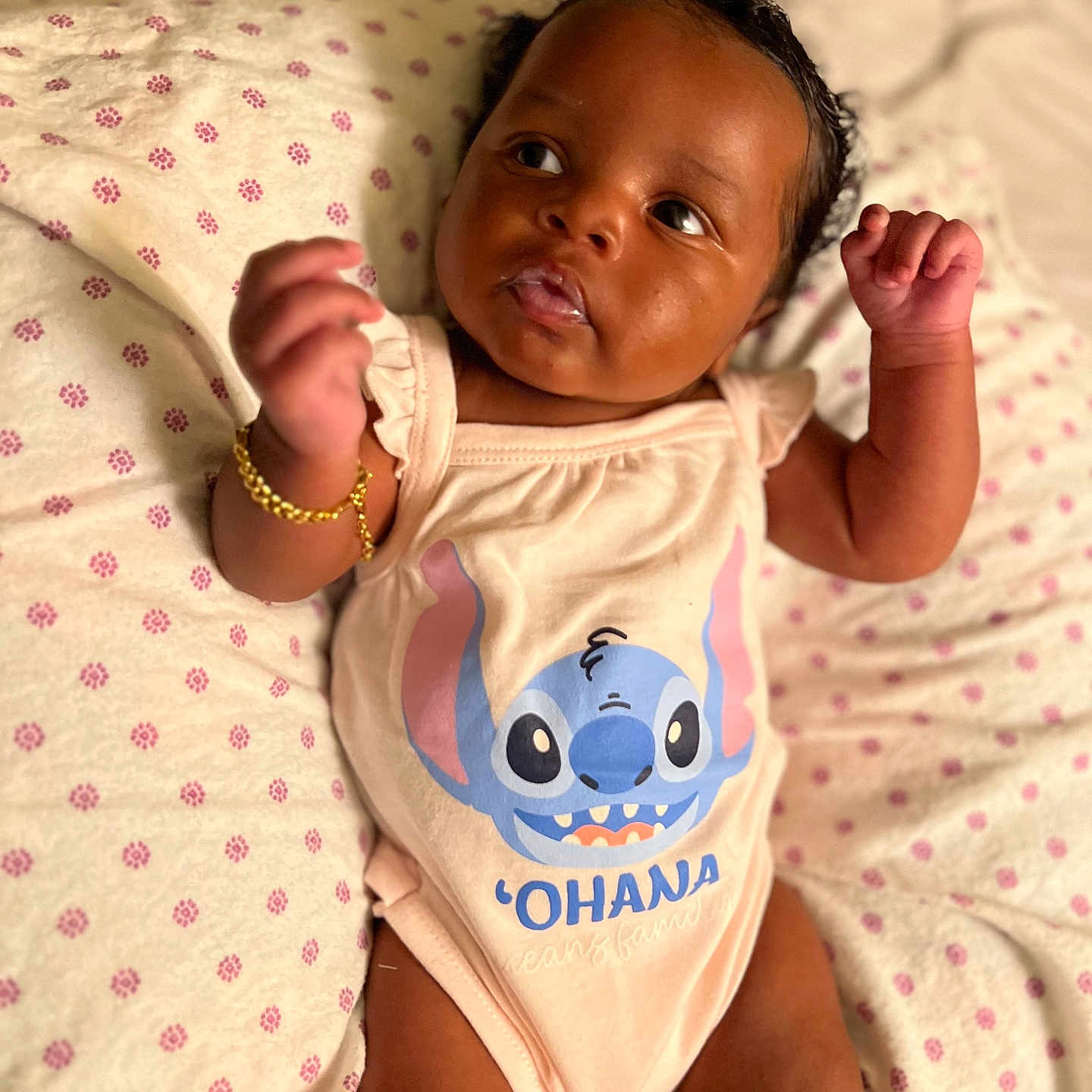 Harlem joined the competition — help win amazing prizes! accessories, baby, bed, bedroom, bodypart, clothing, couch, face, finger, furniture, hand, head, indoors, jewelry, newborn, person, photography, portrait, room, t_shirt