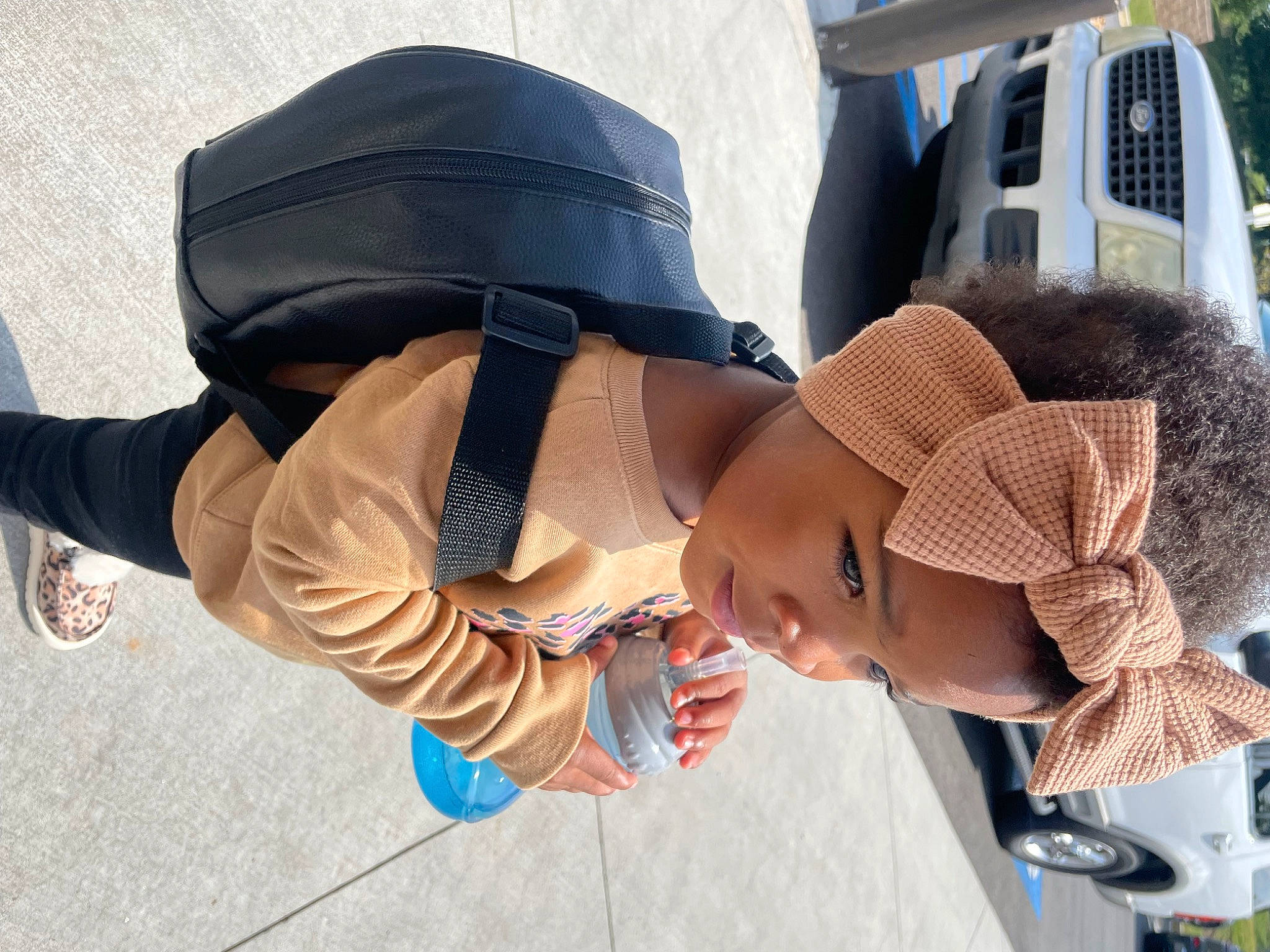 Londynn joined the competition — help win amazing prizes! auto_part, automotive_exterior, baseball_cap, cap, car, child, eyewear, fashion_accessory, fun, hat, headgear, leisure, person, personal_protective_equipment, recreation, sitting, sun_hat, sunglasses, toddler, travel