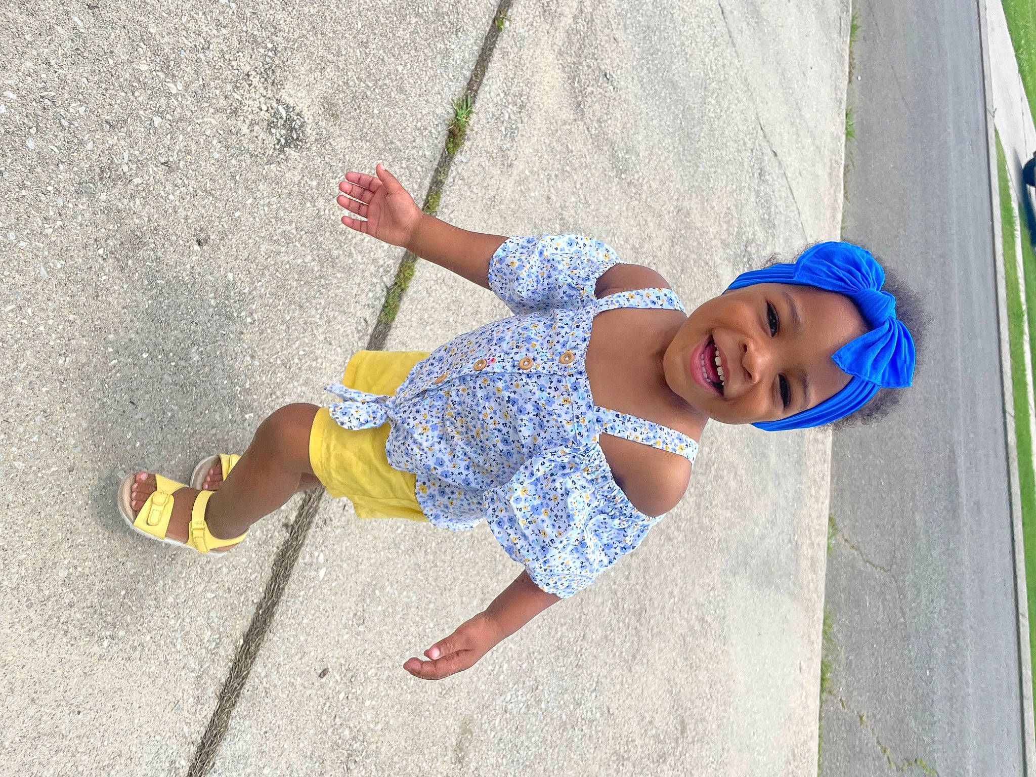 Londynn joined the competition — help win amazing prizes! barefoot, child, city, concrete, electric_blue, foot, fun, grass, happy, hat, human_leg, joy, leg, leisure, people, person, recreation, sand, sidewalk, smile