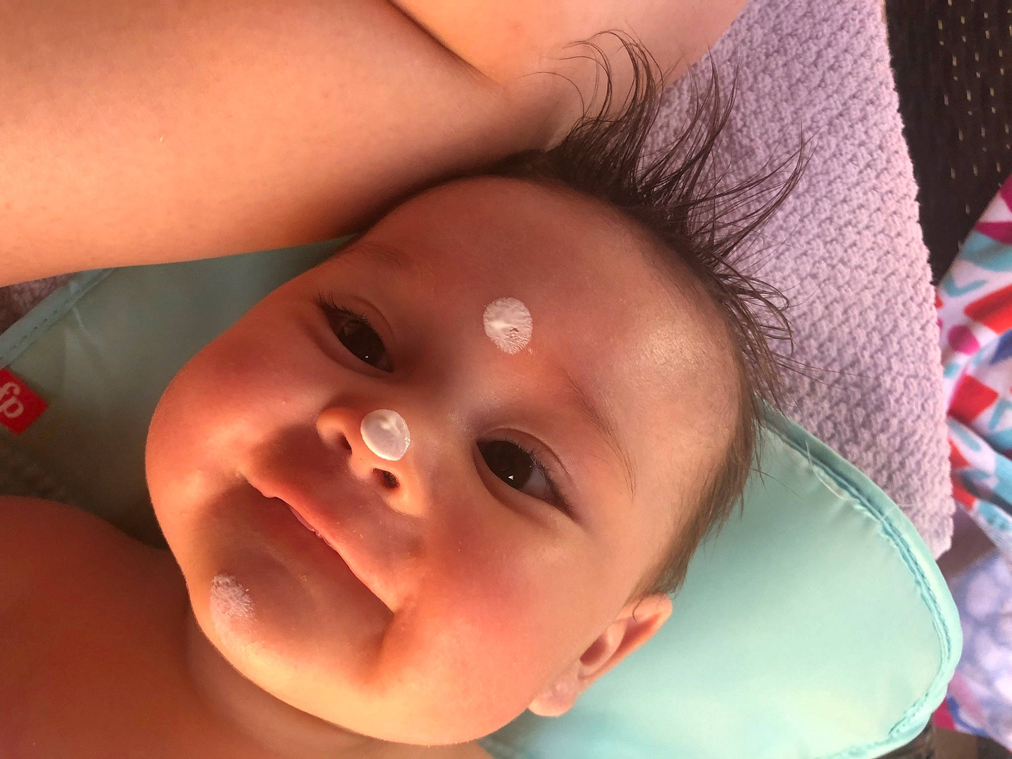 Kai is registered to the contest to win money with this photo: baby, cheek, chest, child, close_up, eyebrow, eyelash, finger, flash_photography, hair, happy, head, iris, lip, mouth, neck, nose, person, skin, smile