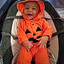 Matthew participe au concours pour gagner de l'argent avec cette photo : baby, baby_seat, baby_toys, child, clothing, comfort, costume, cute, festive, happy, holiday, hood, indoors, infant, orange, person, portrait, pumpkin_costume, seat, smile