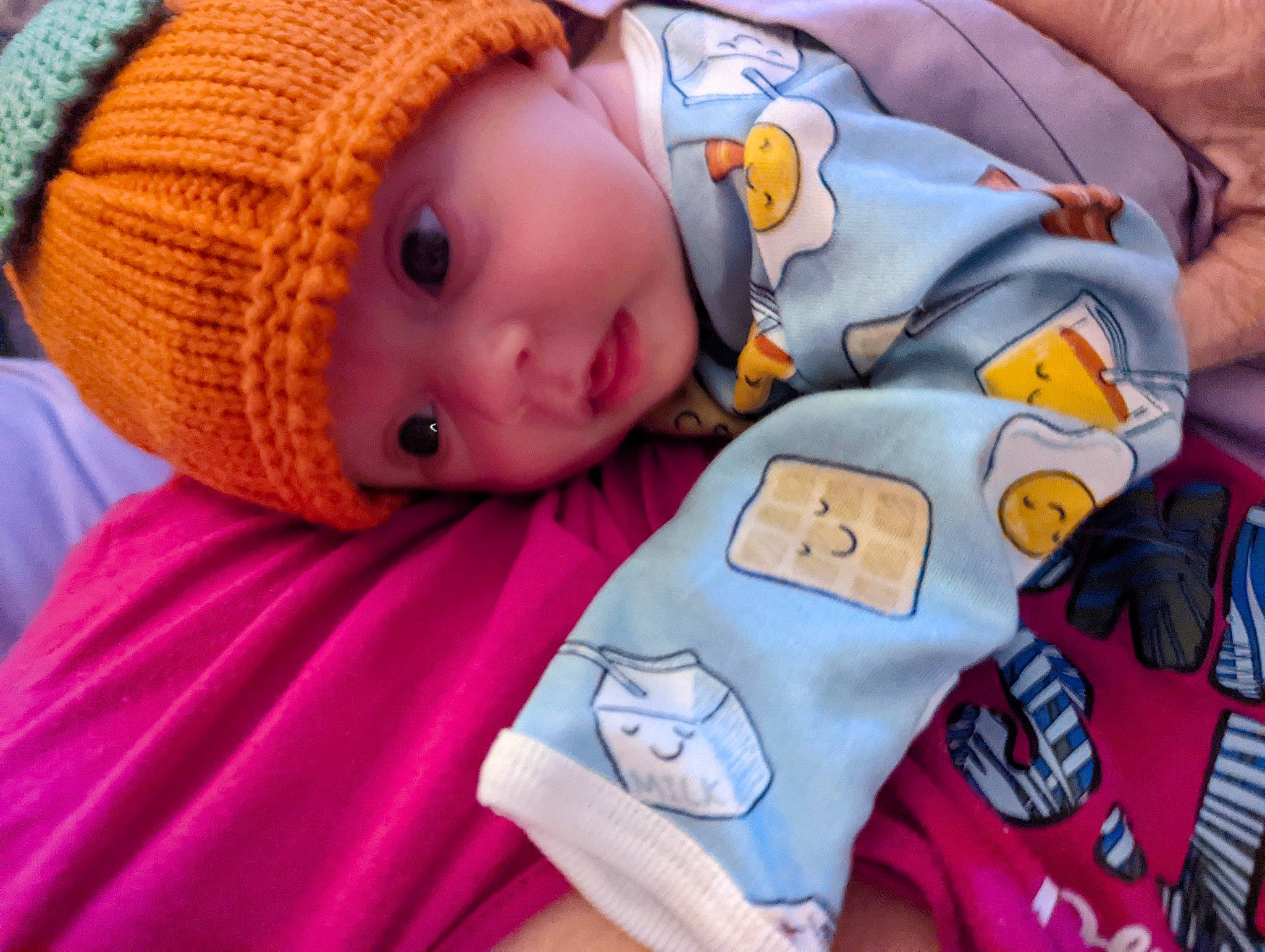 Kylee joined the competition — help win amazing prizes! baby, baby_products, baby_sleeping, baby_toddler_clothing, beanie, cheek, child, comfort, eye, facial_expression, head, headwear, knit_cap, linens, person, product, room, skin, sleeve, textile