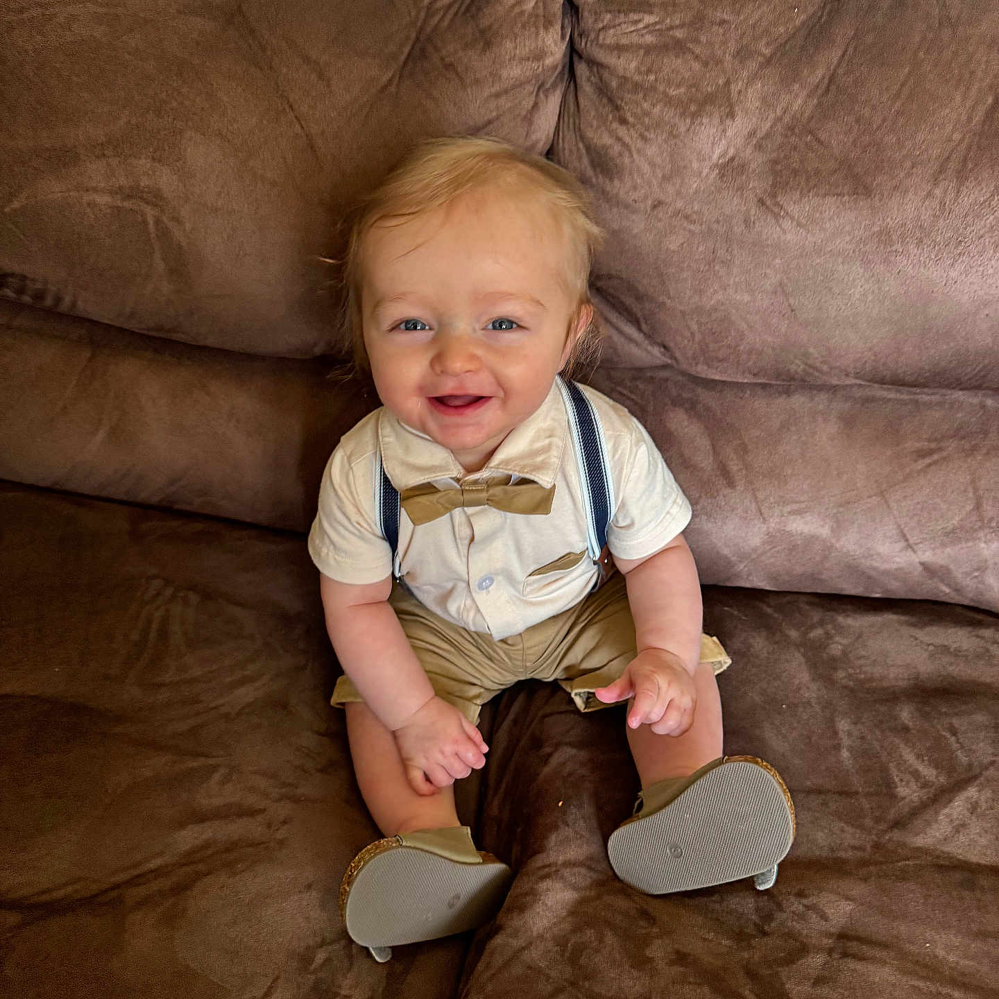 Prestyn is registered to the contest to win money with this photo: accessories, baby, bodypart, chair, clothing, couch, cushion, face, finger, footwear, furniture, hand, head, homedecor, pants, person, photography, portrait, shoe, sitting