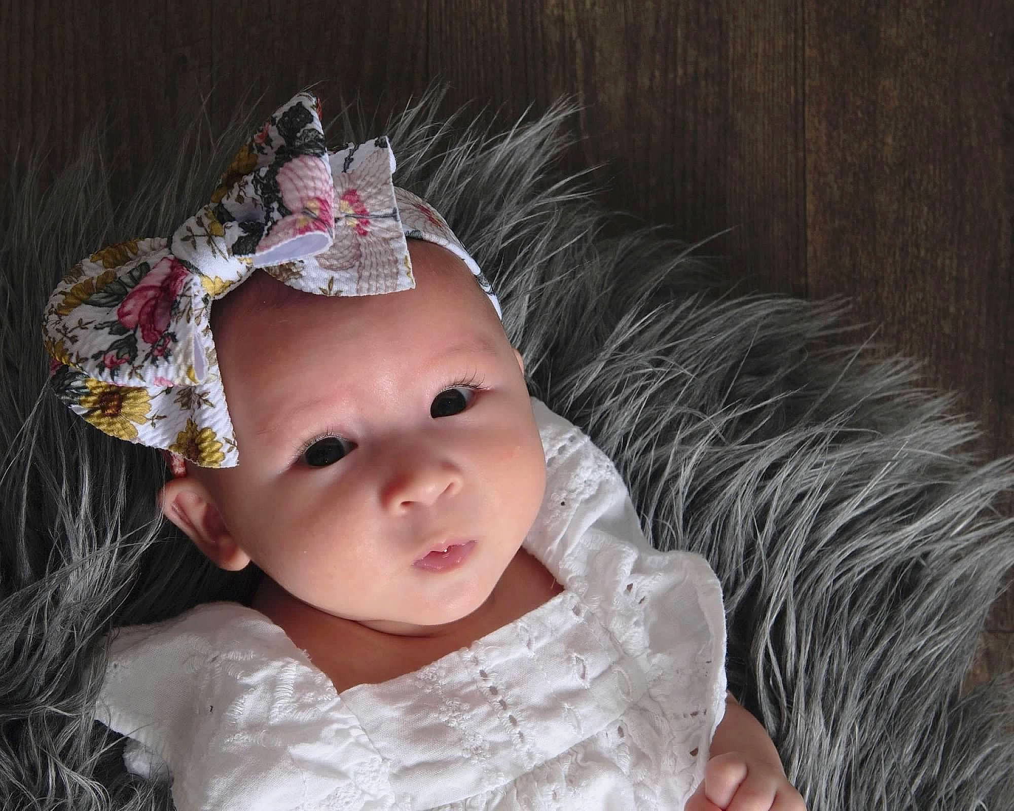 Harper joined the competition — help win amazing prizes! baby, baby_toddler_clothing, cheek, child, costume_hat, dress, embellishment, eye, eyelash, flash_photography, head, headband, headgear, headpiece, headwear, iris, lip, person, pink, skin