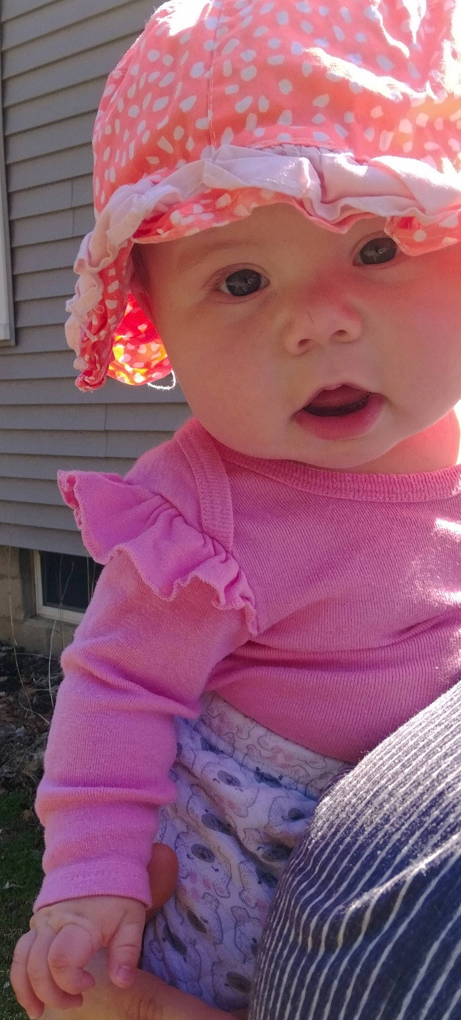 Jemma is registered to the contest to win money with this photo: baby, baby_toddler_clothing, cap, cheek, chin, eye, face, fun, happy, head, headgear, headwear, lip, magenta, nose, person, pink, red, skin, sleeve