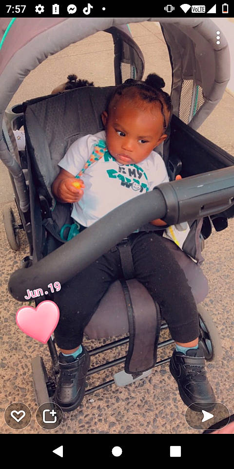 Jayla joined the competition — help win amazing prizes! baby_carriage, beauty, black, chair, comfort, cool, eye, face, fun, head, human_leg, knee, lap, leg, people, person, skin, snapshot, thigh, toddler