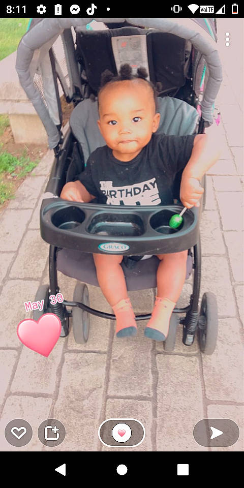Jaylin joined the competition — help win amazing prizes! baby, baby_toddler_clothing, balloon, beauty, black, chair, comfort, face, green, head, leg, person, photograph, plant, product, snapshot, sneakers, tire, toddler, wheel