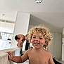Heaven a rejoint le concours — aidez-le/la à gagner de superbes lots ! bare_chest, blonde, blurred_background, candid, child, couch, curly_hair, furniture, happy, home, indoor, kid, living_room, person, playful, portrait, shirtless, smiling, toddler, young_child
