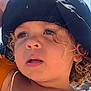 Heaven participe au concours pour gagner de l'argent avec cette photo : beach, blue_sky, child, close_up, curly_hair, cute, daylight, expression, face, hat, outdoor, person, portrait, skin, summer, sunhat, sunlight, toddler, vacation, young_child