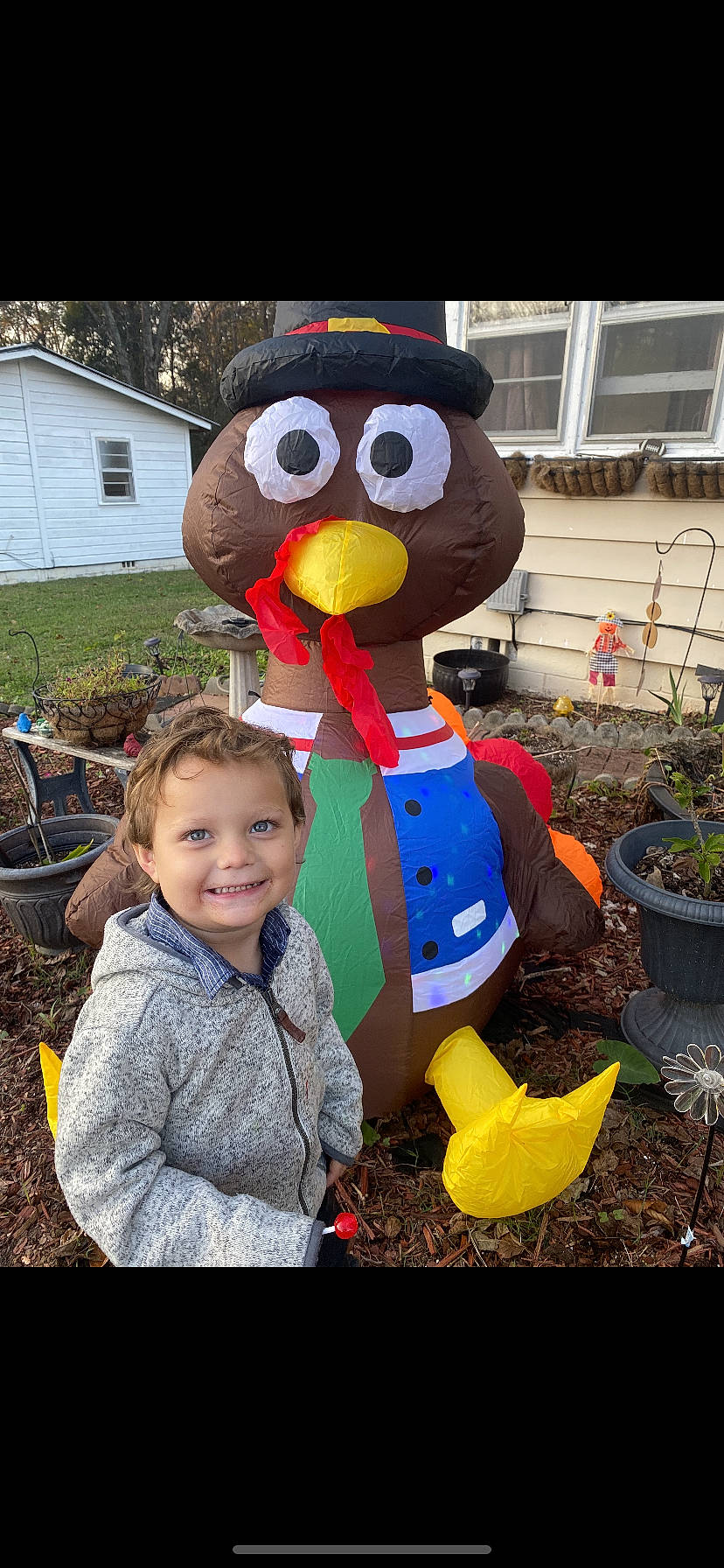 Ryker joined the competition — help win amazing prizes! baby_toddler_clothing, child, event, flowerpot, fun, garden, grass, happy, houseplant, joy, lawn_ornament, leisure, mascot, party_supply, person, plant, recreation, smile, soil, toddler