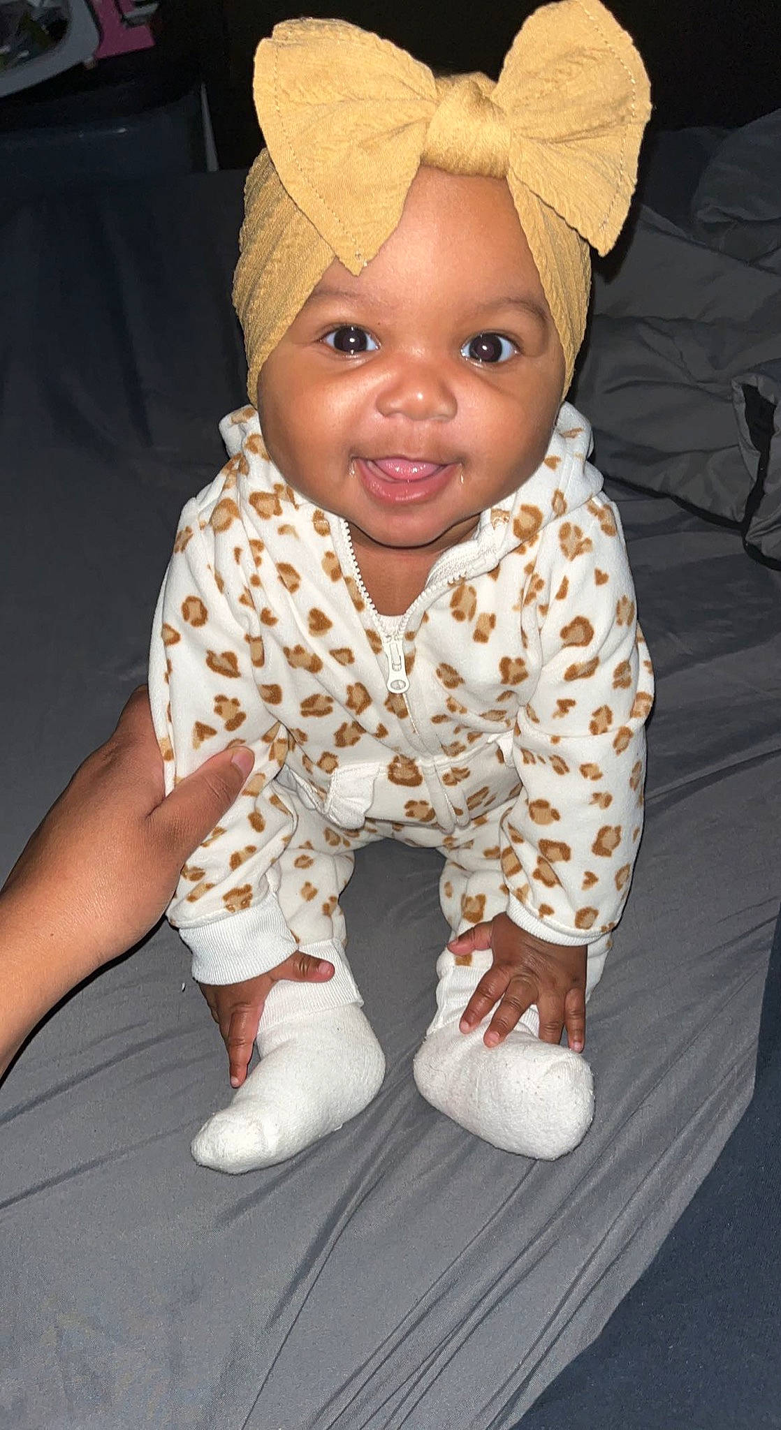 Zyaira joined the competition — help win amazing prizes! baby, baby_toddler_clothing, barefoot, cap, cheek, child, chin, costume_hat, eye, face, fashion_accessory, flooring, foot, headwear, outerwear, pattern, person, skin, sleeve, smile